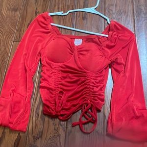 A red shirt with padding on the inside